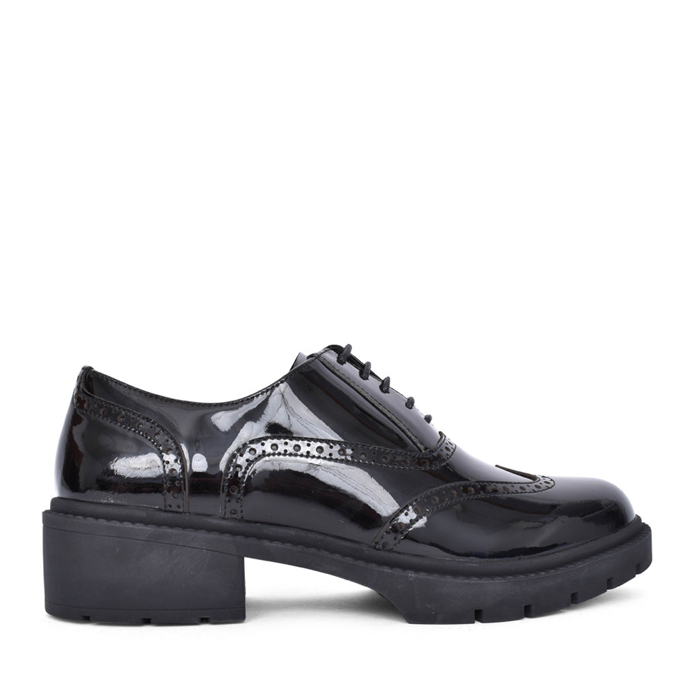 Ladies Aston Heeled Brogue Shoe In Blk Patent